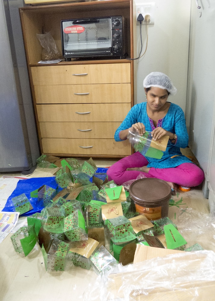 Samina Shaikh constructing chocolate gift boxes