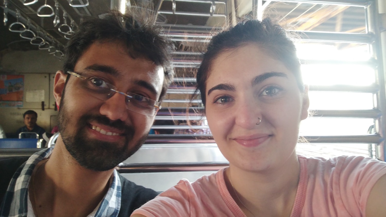 Sanket and Elizabeth on a train to Bandra