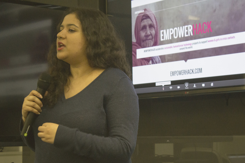 Hera Hussain speaking at the UX For Change event about EmpowerHack